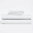 White, Lyocell Cotton sheet set, including flat sheet, fitted sheet, and two pillow cases.